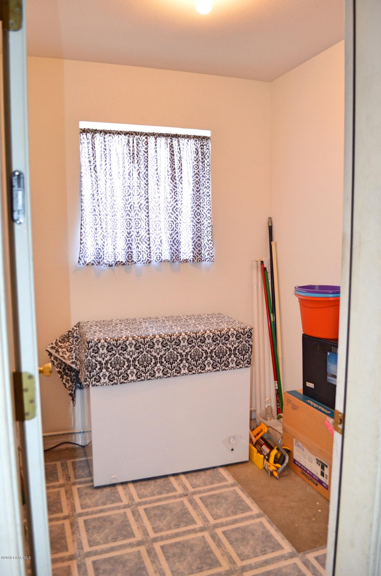 4660 North Miner Road Prescott Valley, AZ 86314 - Photo 18 of 20 a view of front door of house