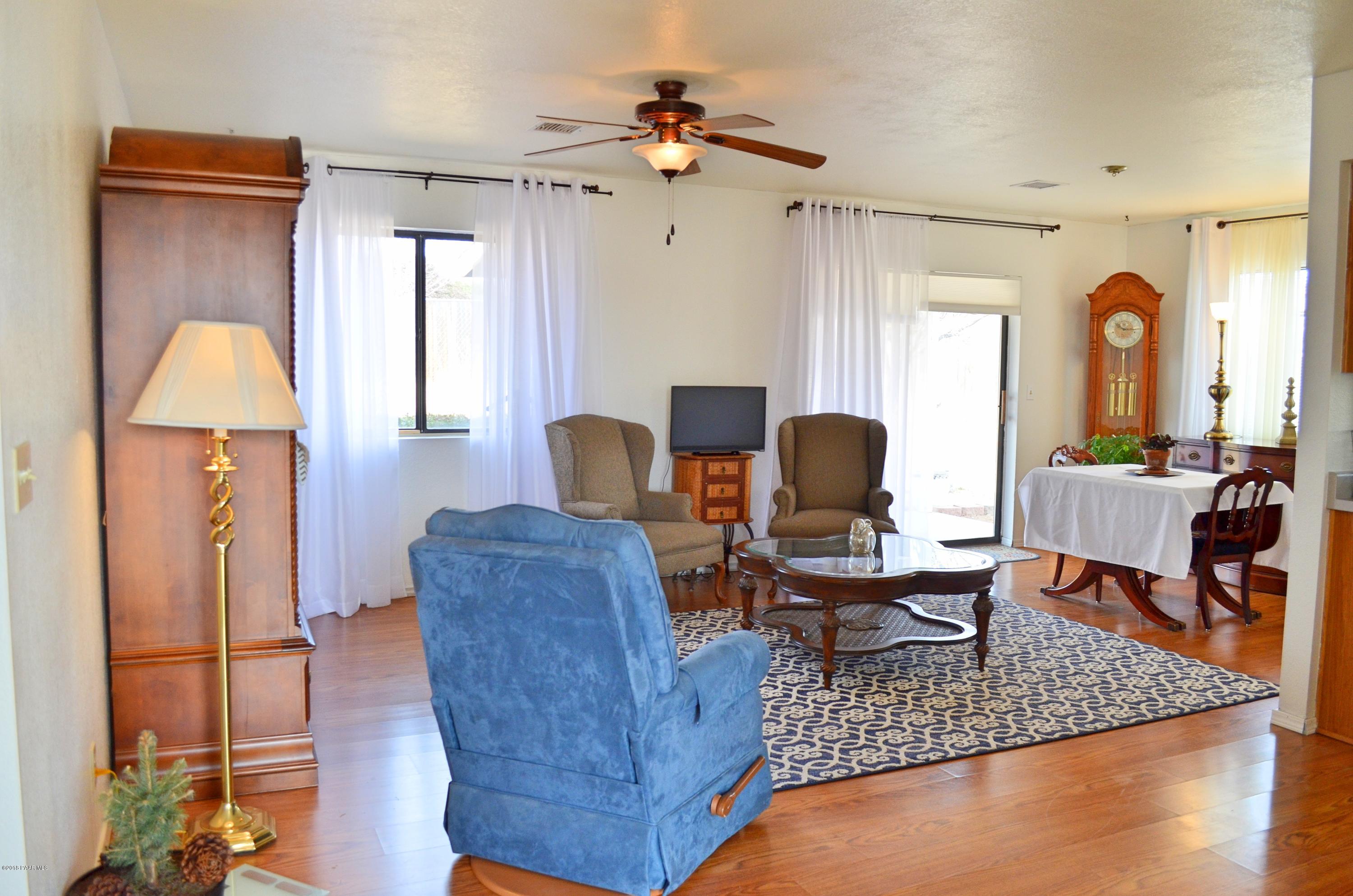 4660 North Miner Road Prescott Valley, AZ 86314 - Photo 4 of 20 a living room with furniture and a window