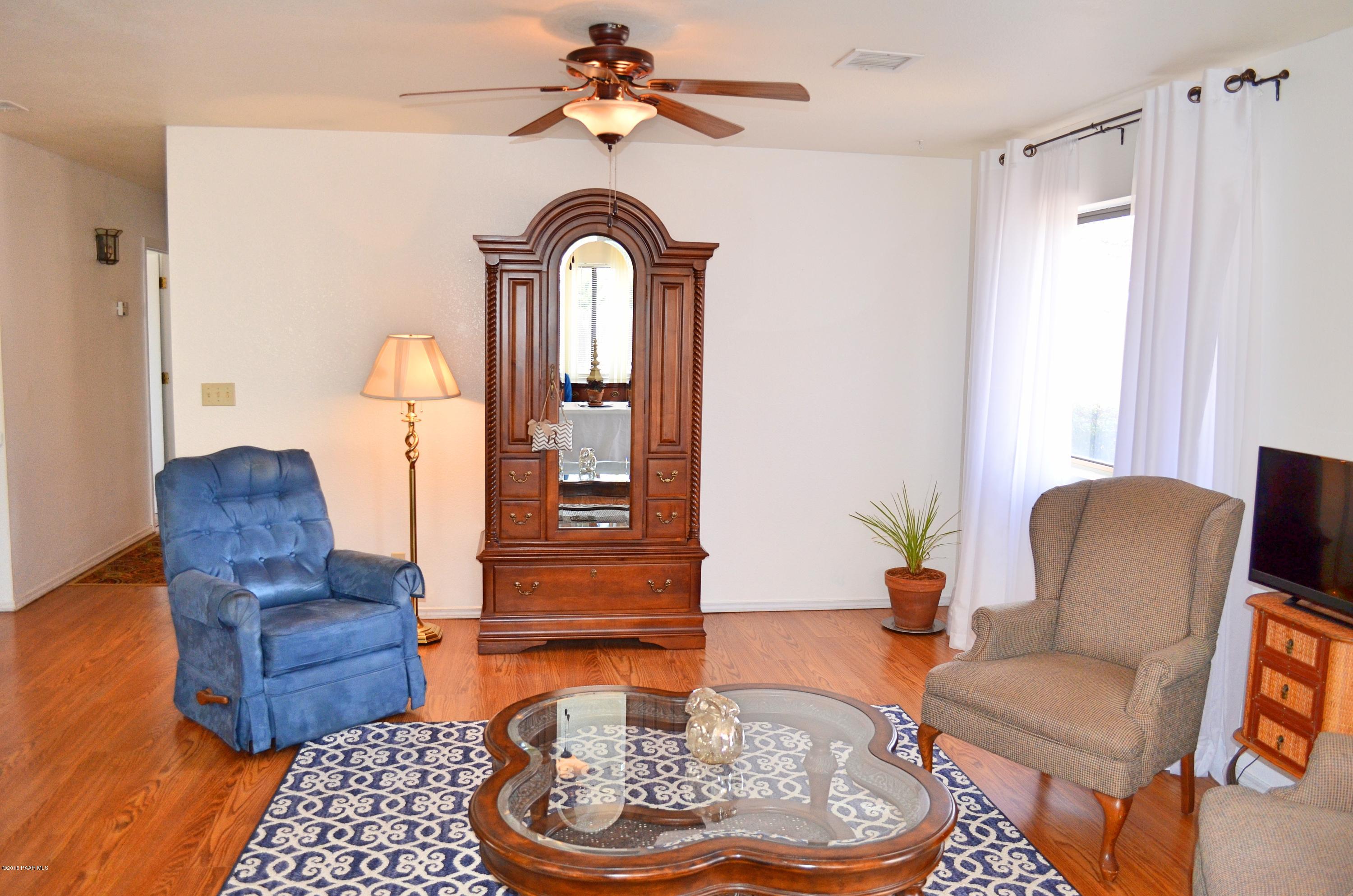 4660 North Miner Road Prescott Valley, AZ 86314 - Photo 5 of 20 a living room with furniture and a rug