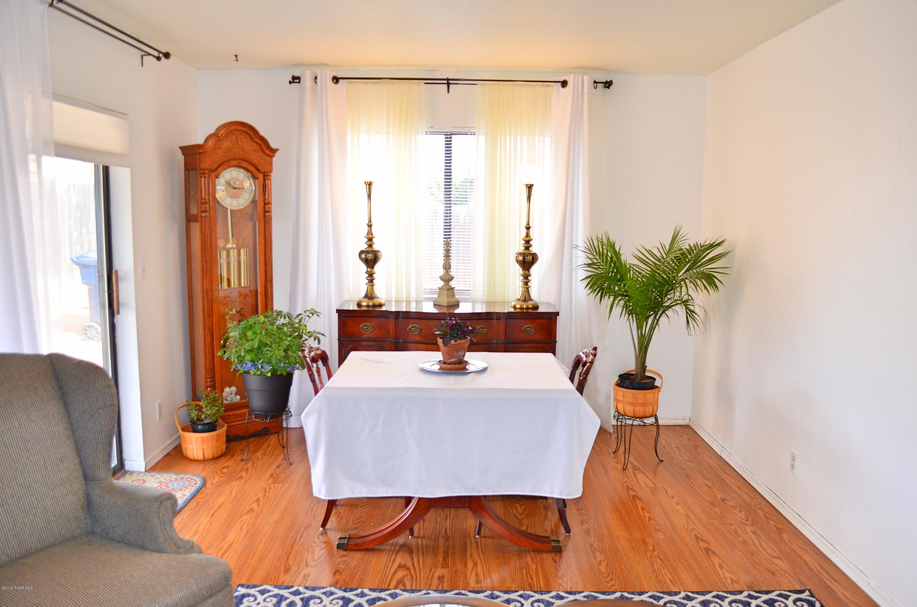 4660 North Miner Road Prescott Valley, AZ 86314 - Photo 6 of 20 a living room with furniture and a potted plant