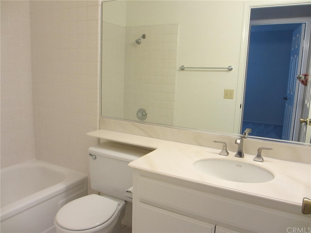 12 Brookdale Irvine, CA 92604 - Photo 12 of 28 a bathroom with a sink toilet and a bathtub