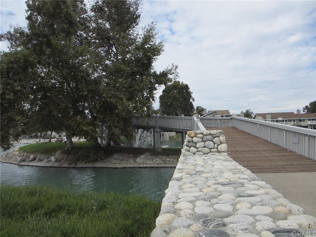 12 Brookdale Irvine, CA 92604 - Photo 18 of 28 a view of a lake with a yard