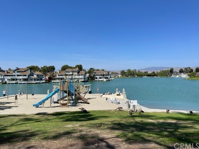 12 Brookdale Irvine, CA 92604 - Photo 19 of 28 a view of a lake with a house