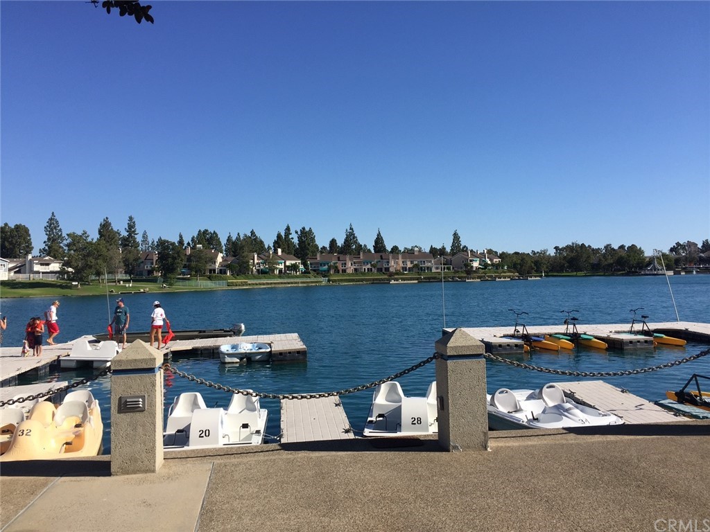 12 Brookdale Irvine, CA 92604 - Photo 21 of 28 a view of roof deck with two chairs and a table