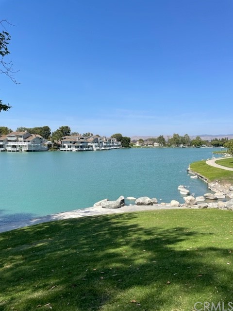 12 Brookdale Irvine, CA 92604 - Photo 23 of 28 a view of a lake with houses in back