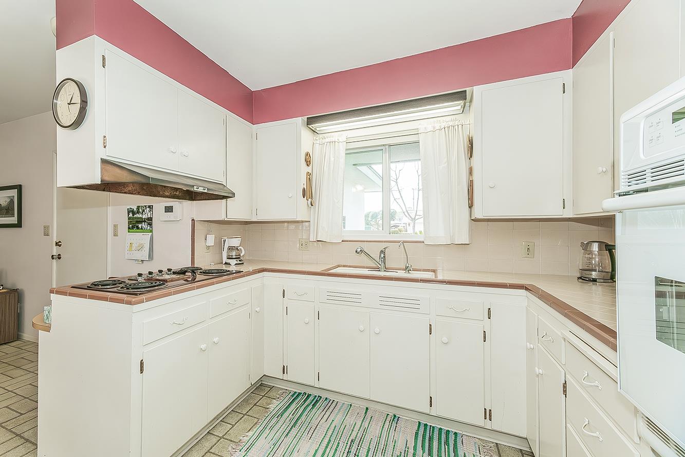 1416 South Church Avenue Reedley, CA 93654 - Photo 16 of 41 a kitchen with a sink cabinets and window