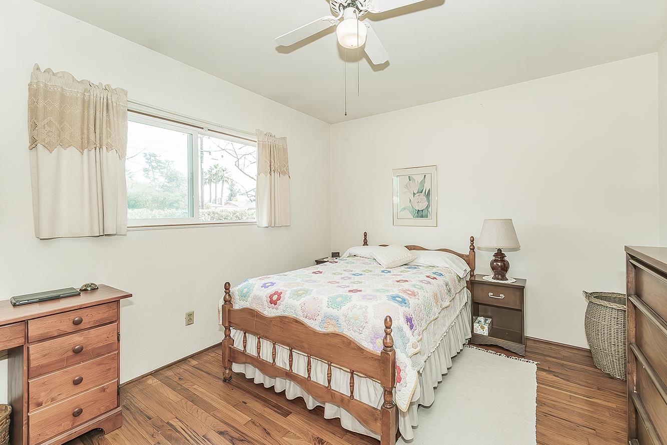 1416 South Church Avenue Reedley, CA 93654 - Photo 17 of 41 a bedroom with a bed and a window