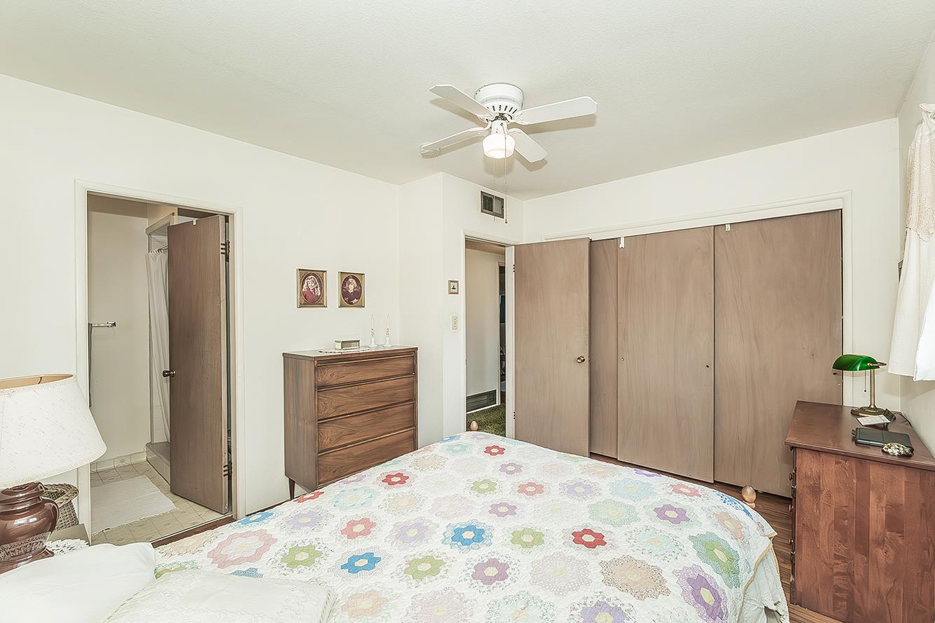 1416 South Church Avenue Reedley, CA 93654 - Photo 19 of 41 a bedroom with a bed and a dresser