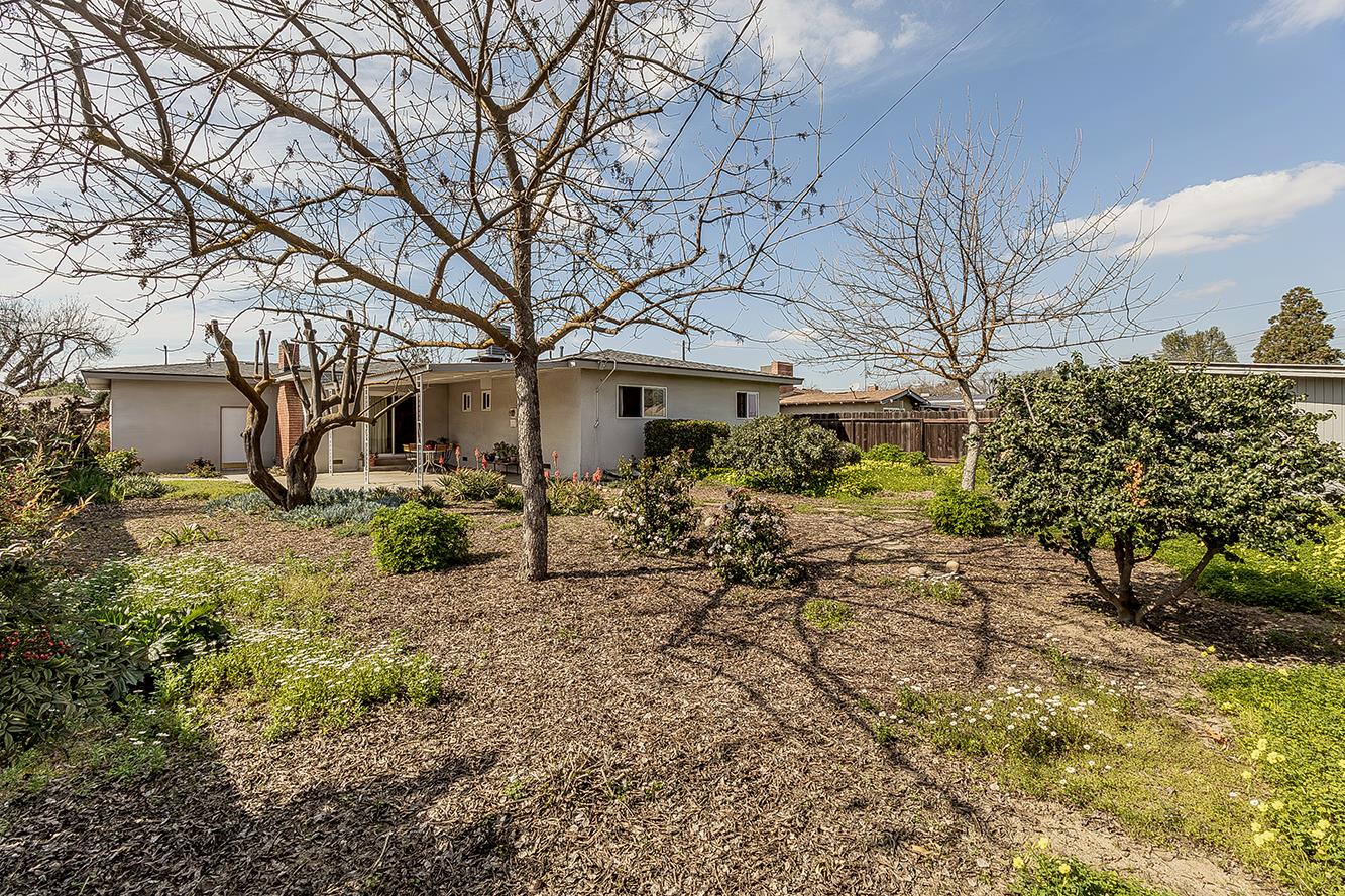 1416 South Church Avenue Reedley, CA 93654 - Photo 20 of 41 a view of a house with a yard and sitting area