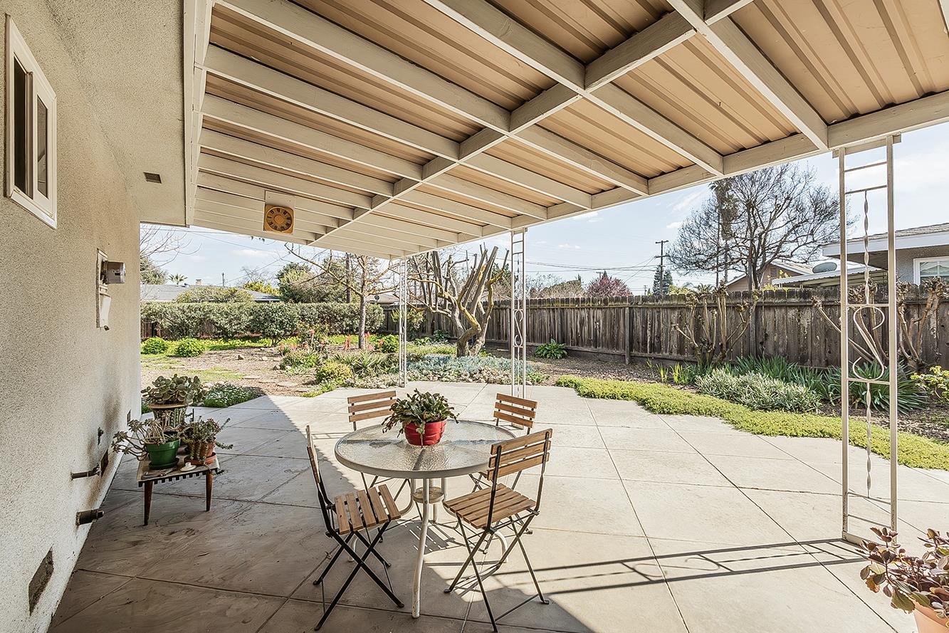 1416 South Church Avenue Reedley, CA 93654 - Photo 31 of 41 a view of patio with table and chairs and wooden fence