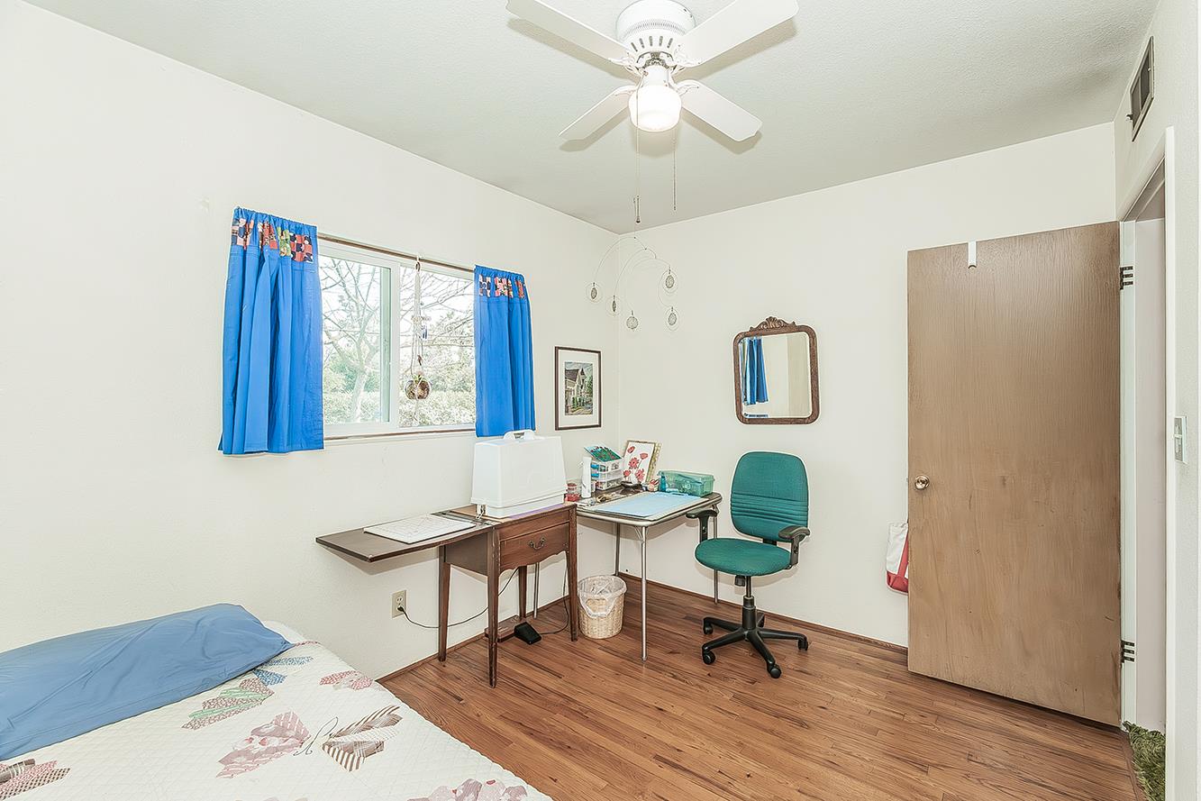 1416 South Church Avenue Reedley, CA 93654 - Photo 32 of 41 a living room with furniture and a window