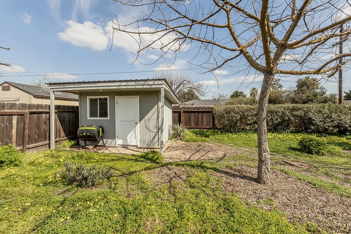1416 South Church Avenue Reedley, CA 93654 - Photo 40 of 41 a view of a house with backyard