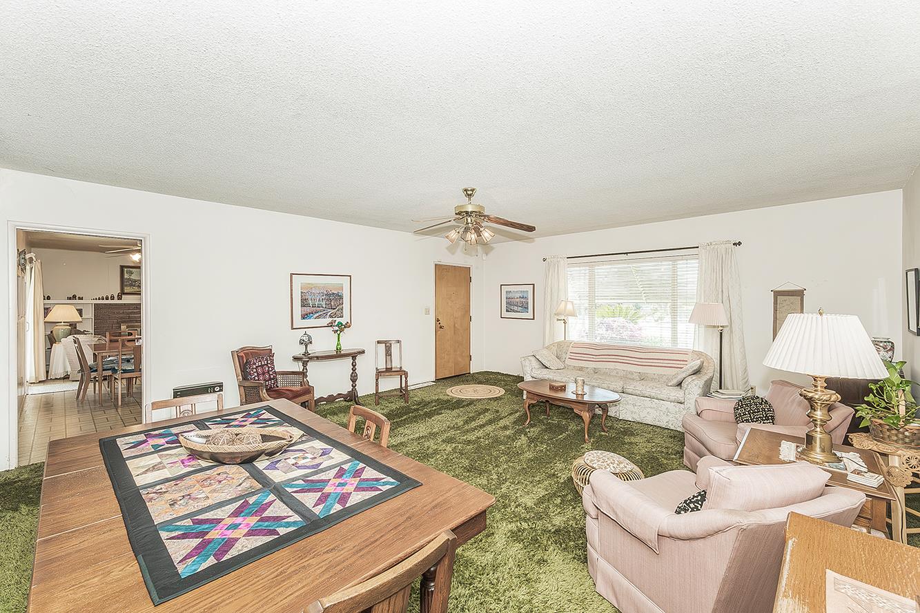 1416 South Church Avenue Reedley, CA 93654 - Photo 8 of 41 a living room with furniture and a table