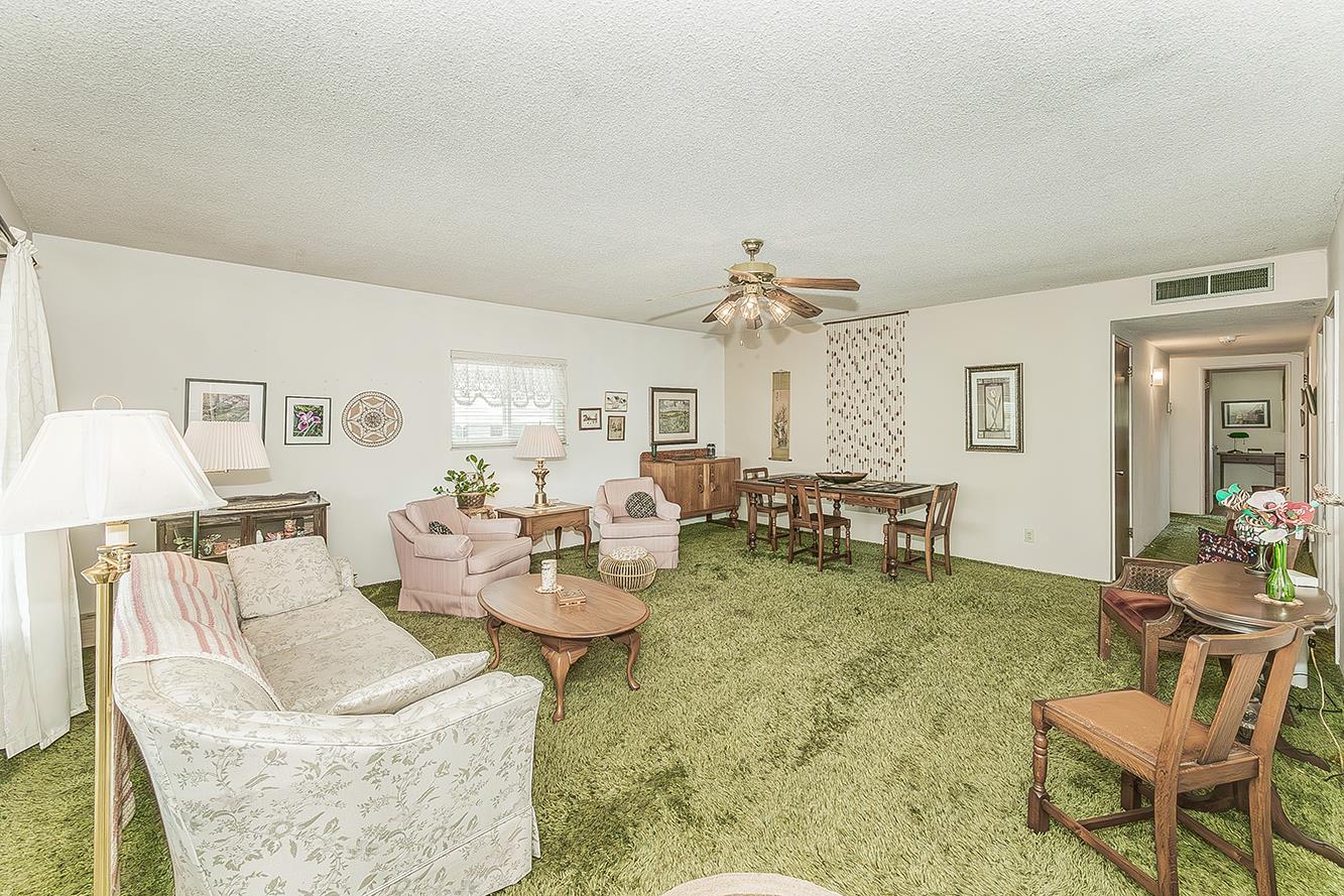 1416 South Church Avenue Reedley, CA 93654 - Photo 8 of 41 a living room with furniture and wooden floor