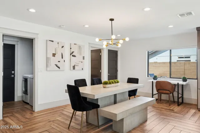 a view of a dining room with furniture