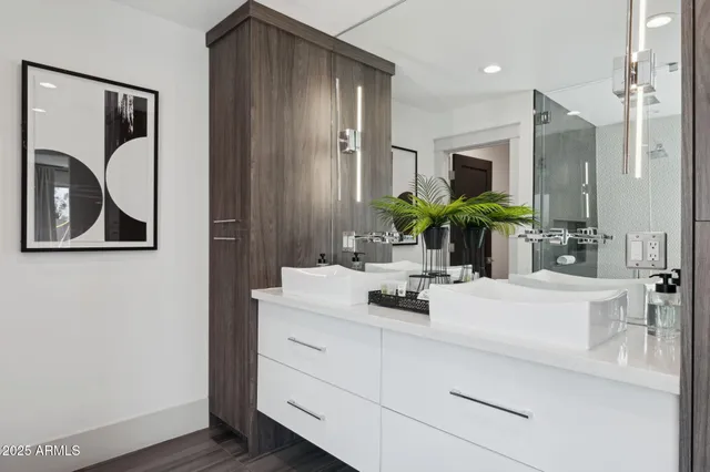 a bathroom with a tub and shower