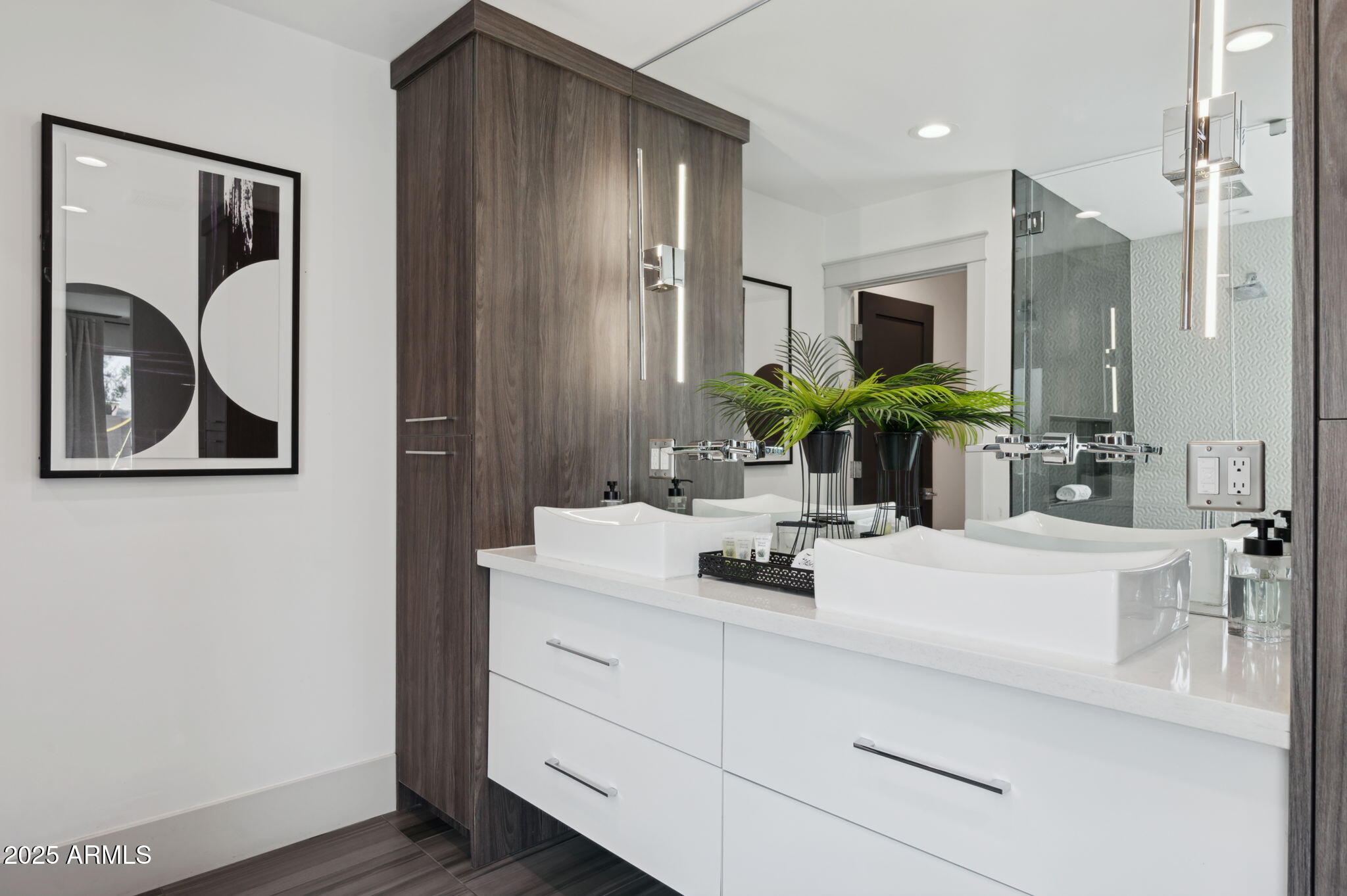 5301 East Tierra Buena Lane Scottsdale, AZ 85254 - Photo 21 of 61 a bathroom with a sink and a mirror