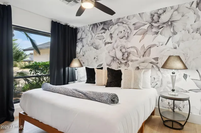 a view of a backyard with sitting area