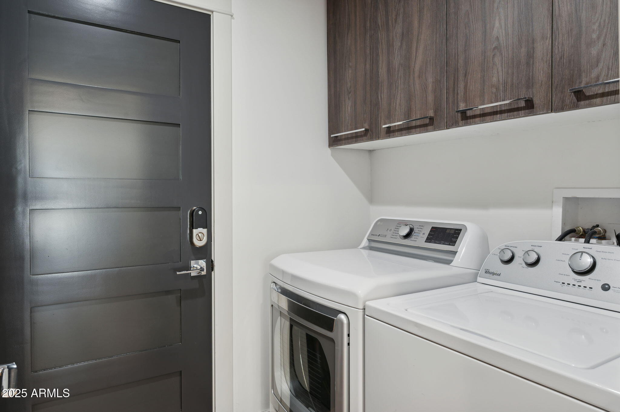 5301 East Tierra Buena Lane Scottsdale, AZ 85254 - Photo 36 of 61 a utility room with dryer and washer
