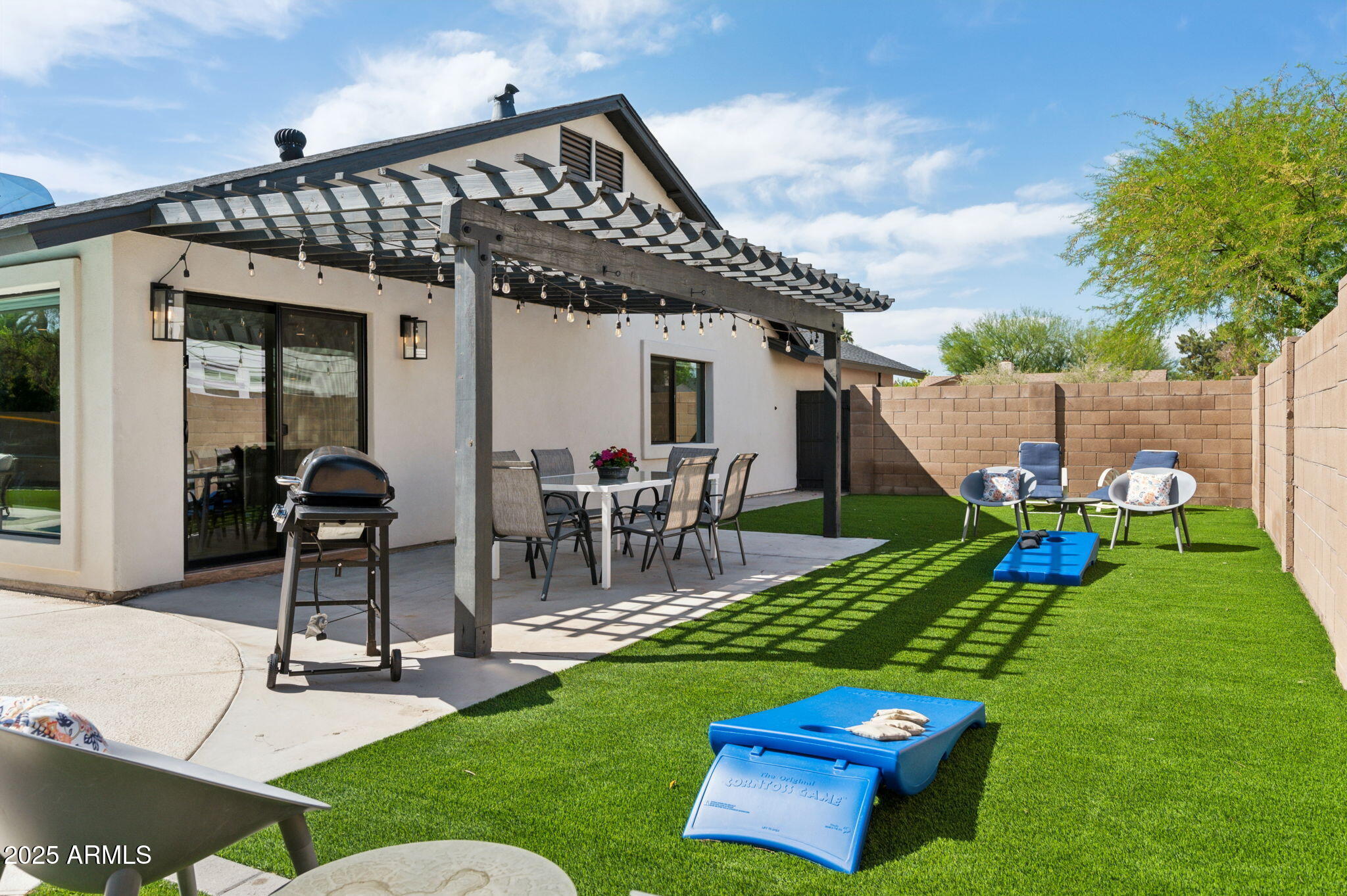5301 East Tierra Buena Lane Scottsdale, AZ 85254 - Photo 41 of 61 a view of a backyard with a patio