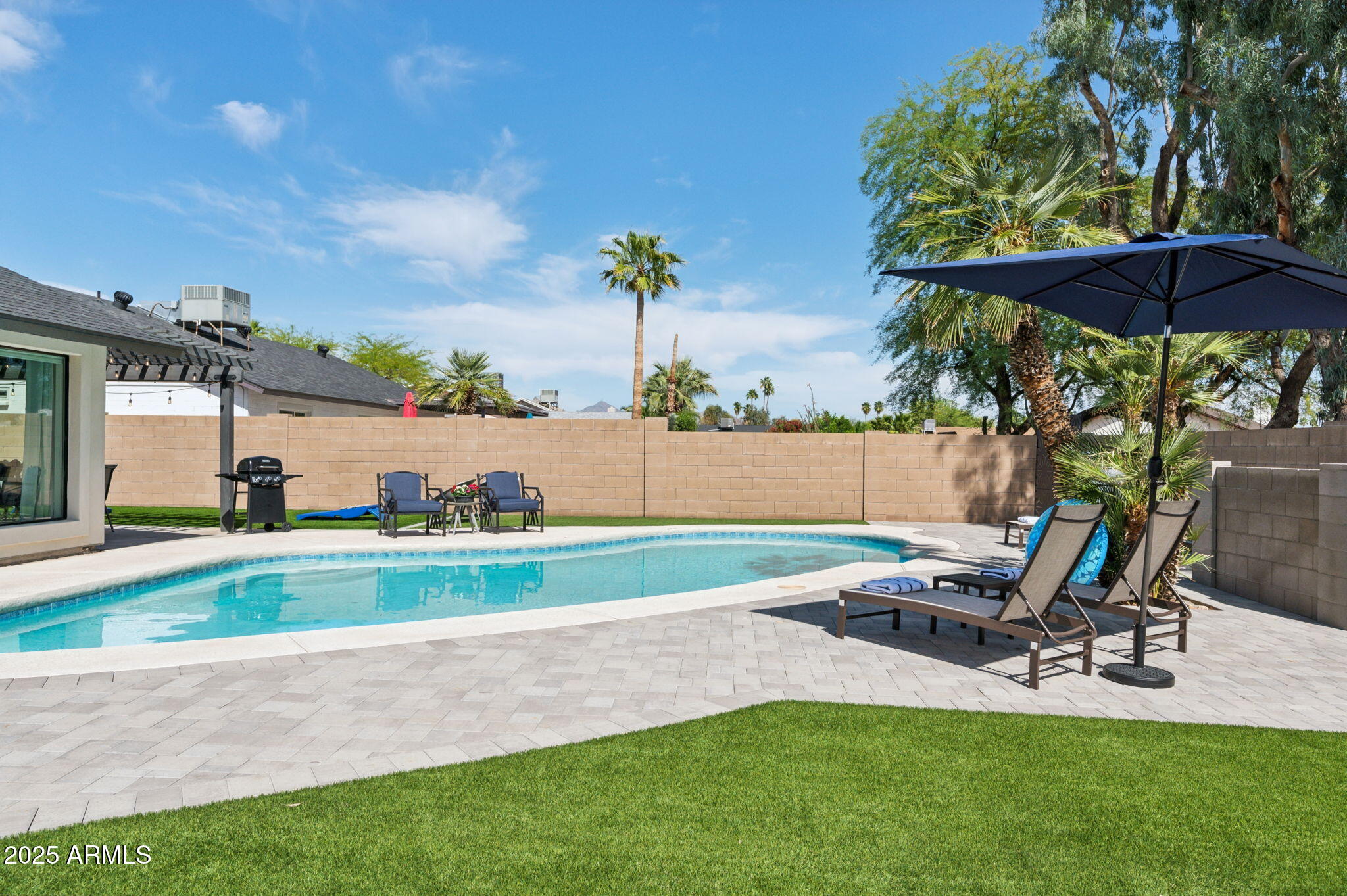 5301 East Tierra Buena Lane Scottsdale, AZ 85254 - Photo 45 of 61 a view of backyard with outdoor seating