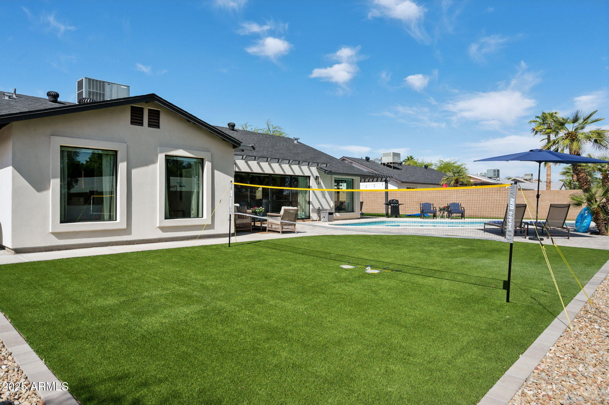 5301 East Tierra Buena Lane Scottsdale, AZ 85254 - Photo 47 of 61 a view of a house with a backyard