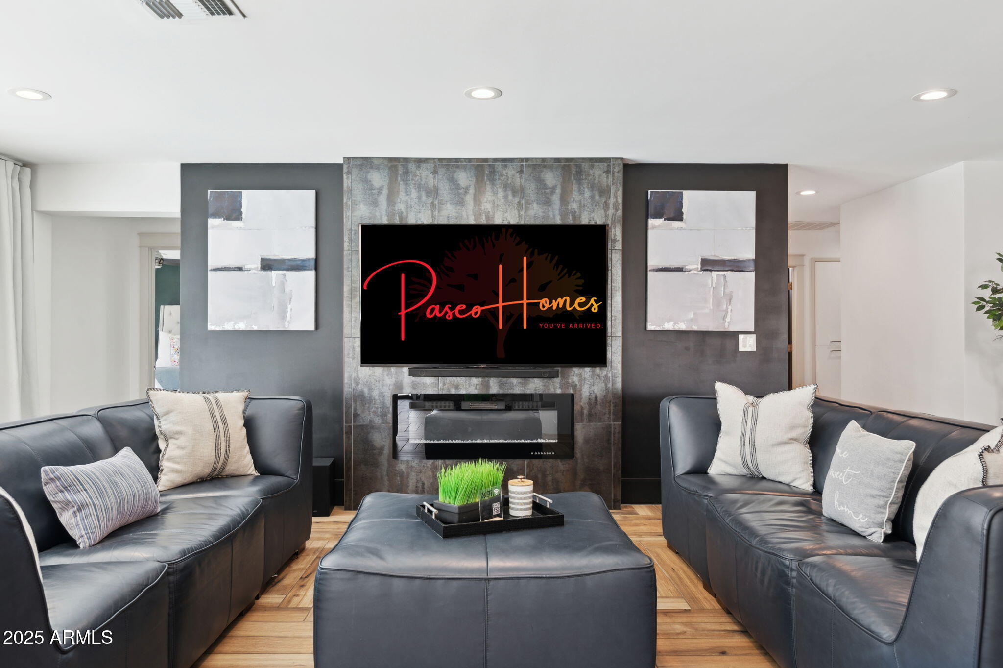 5301 East Tierra Buena Lane Scottsdale, AZ 85254 - Photo 8 of 61 a living room with furniture and a fireplace