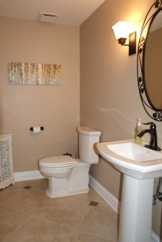 4259 Keim Road Lisle, IL 60532 - Photo 13 of 25 a bathroom with a sink and a mirror
