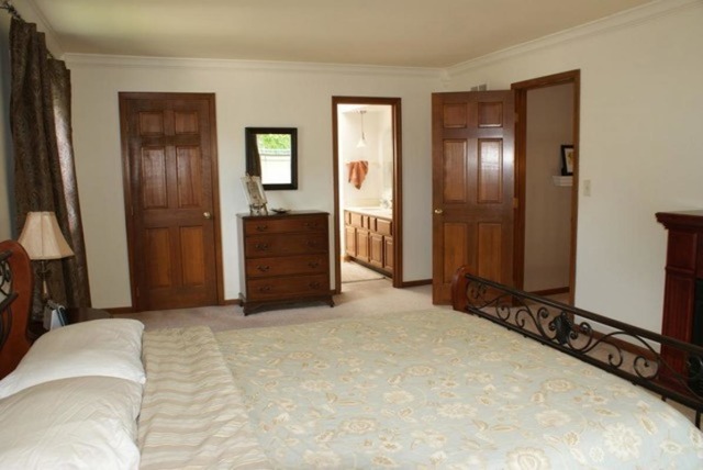 4259 Keim Road Lisle, IL 60532 - Photo 15 of 25 a bedroom with a bed and a dresser