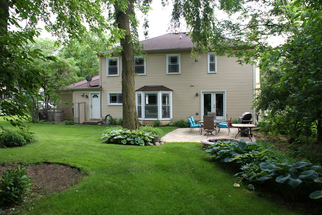 4259 Keim Road Lisle, IL 60532 - Photo 25 of 25 a front view of a house with garden and porch