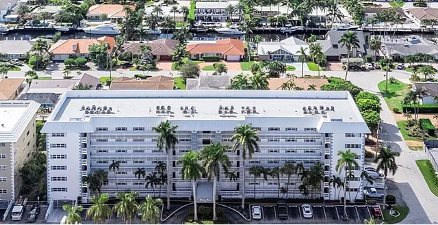 a view of a building with a garden