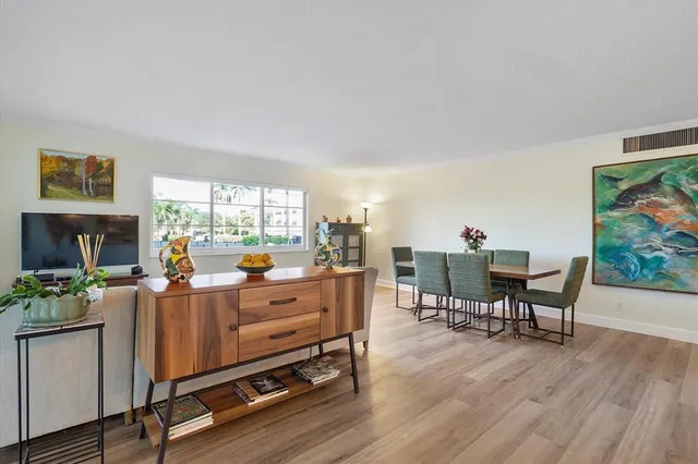 a room with furniture and wooden floor