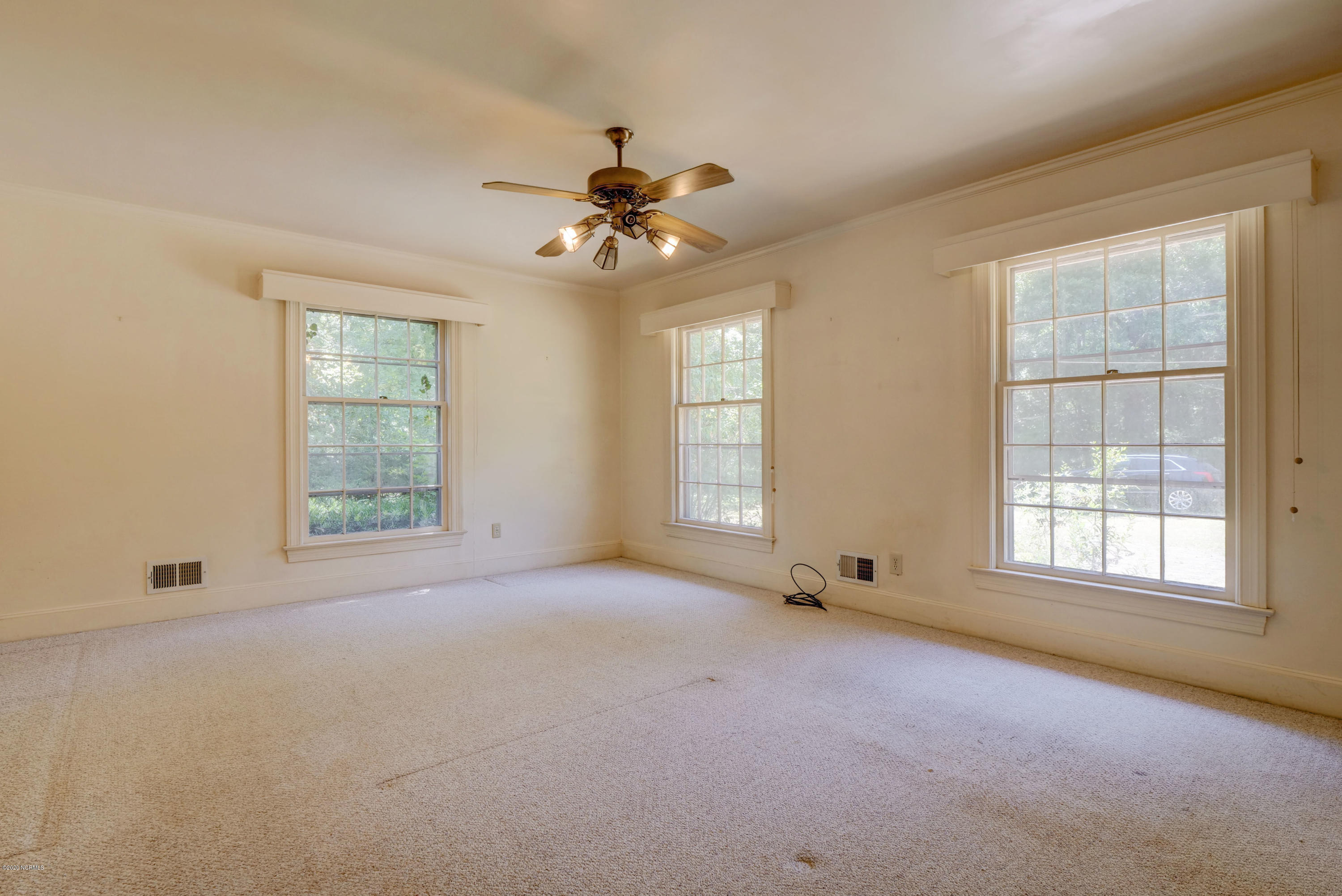 6318 Fox Run Road Wilmington, NC 28409 - Photo 17 of 46 Master bedroom.