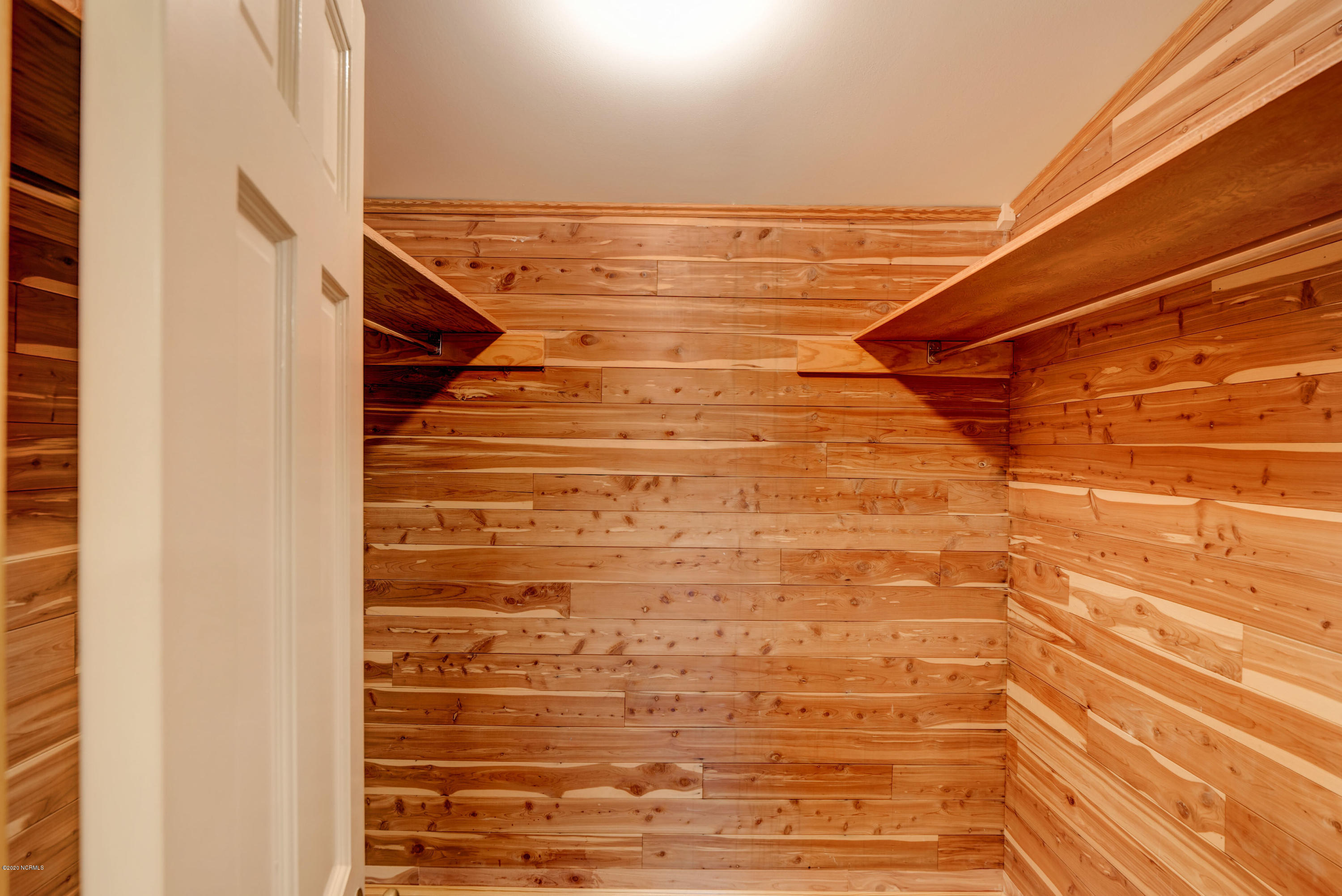 6318 Fox Run Road Wilmington, NC 28409 - Photo 28 of 46 Cedar-lined closet off of bedroom 3.