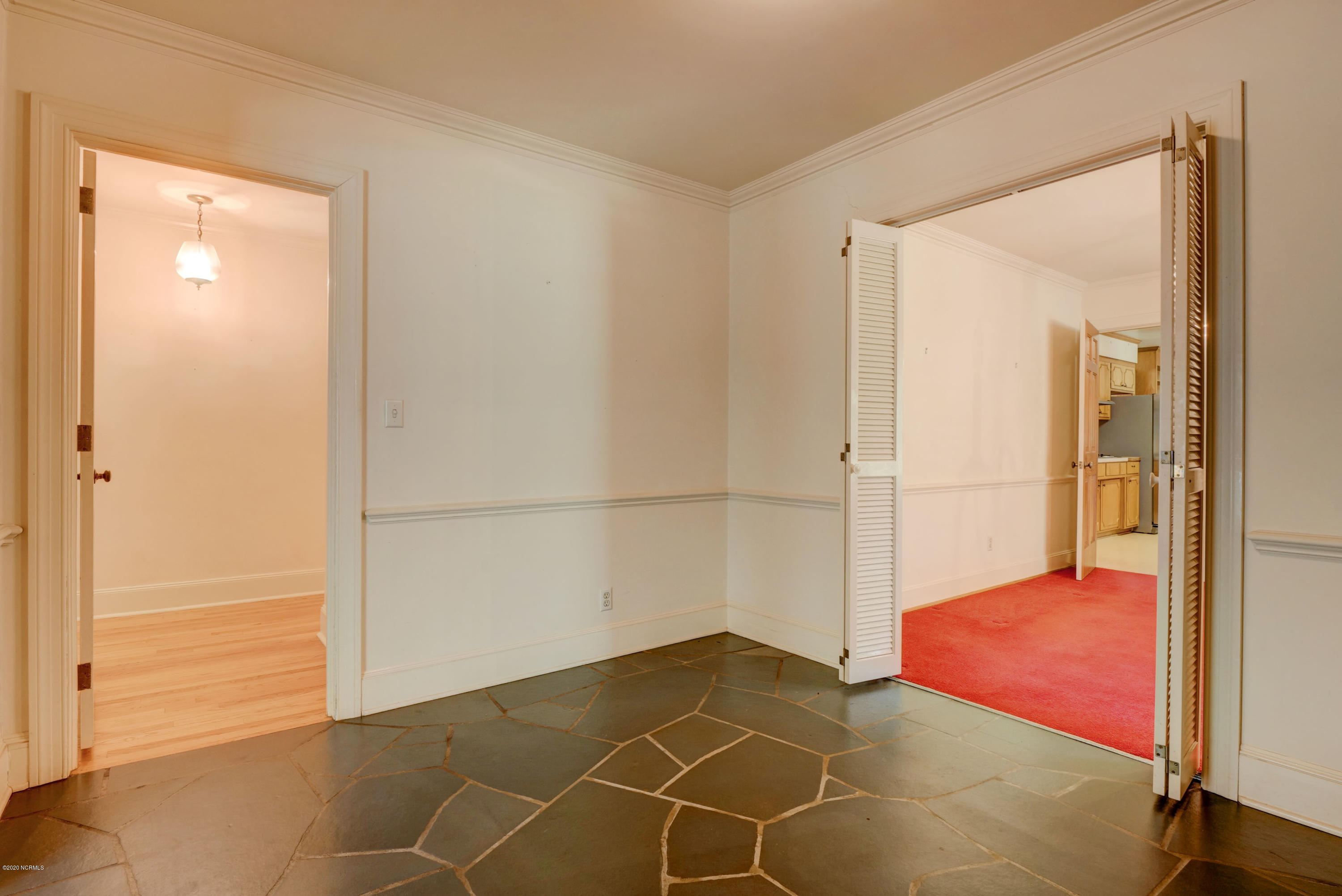 6318 Fox Run Road Wilmington, NC 28409 - Photo 5 of 46 Foyer looking into the dining room.