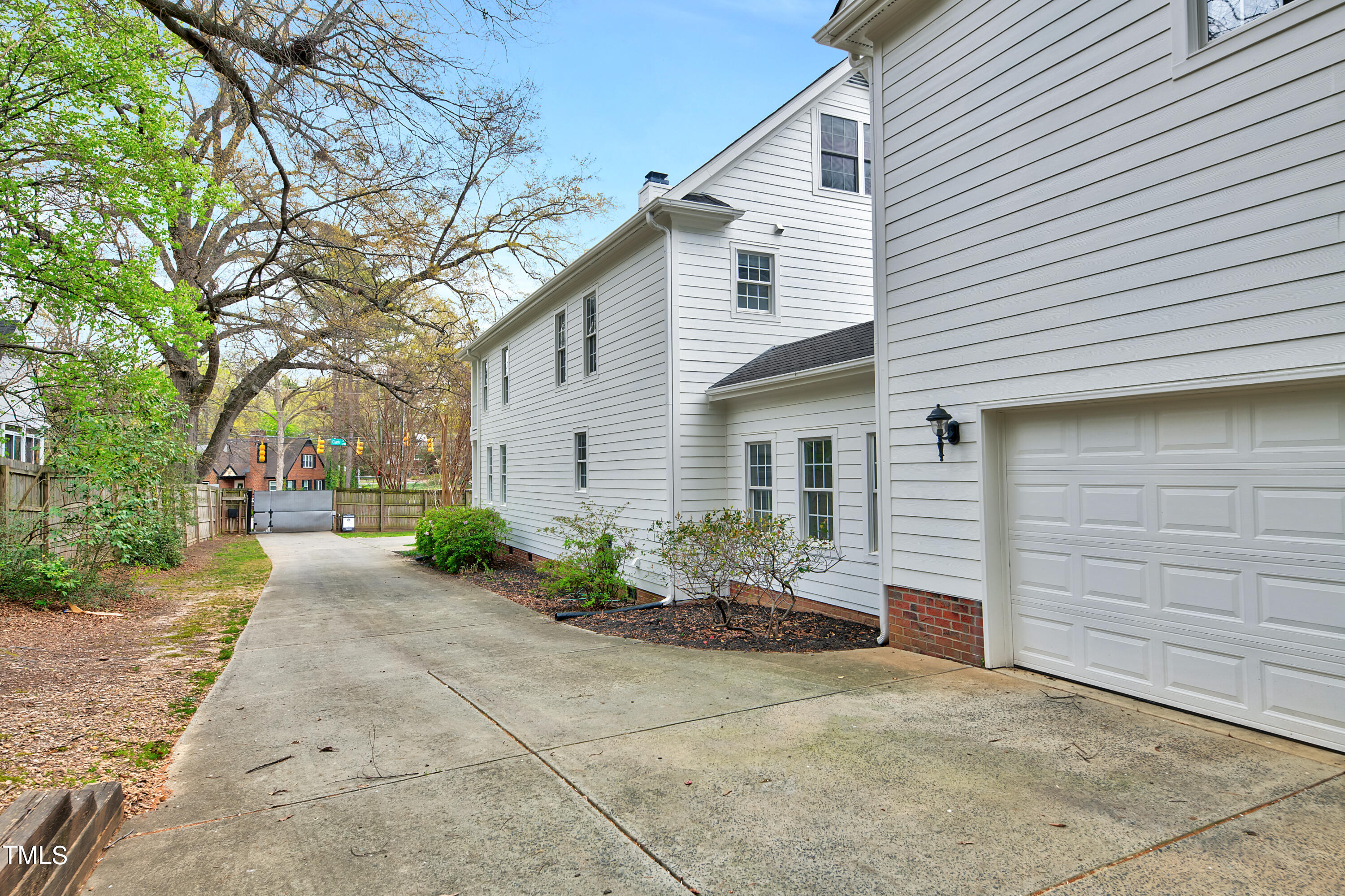 201 Brooks Avenue Raleigh, NC 27607 - Photo 2 of 44 a front view of a house with garden