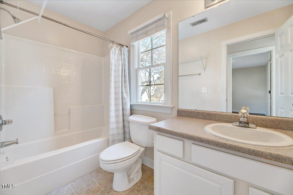201 Brooks Avenue Raleigh, NC 27607 - Photo 30 of 44 a bathroom with a sink toilet and shower