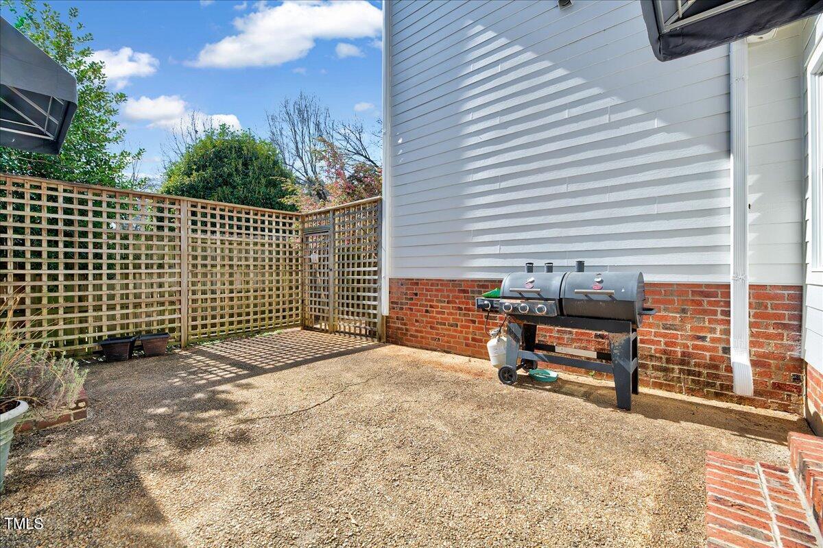 201 Brooks Avenue Raleigh, NC 27607 - Photo 33 of 44 a backyard of a house with outdoor seating