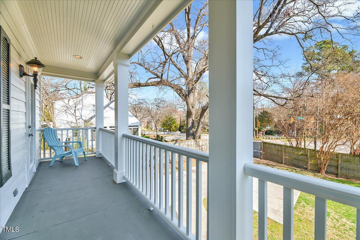 201 Brooks Avenue Raleigh, NC 27607 - Photo 35 of 44 a view of a porch with wooden floor and outdoor space