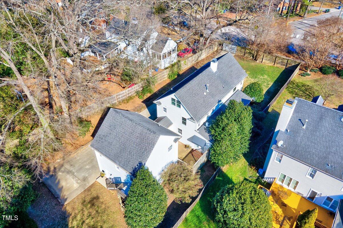 201 Brooks Avenue Raleigh, NC 27607 - Photo 37 of 44 an aerial view of a house with a yard and outdoor seating
