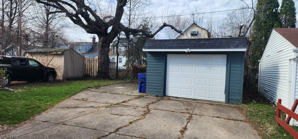 1514 Clermont Road Cleveland, OH 44110 - Photo 16 of 16 Detached garage with concrete driveway