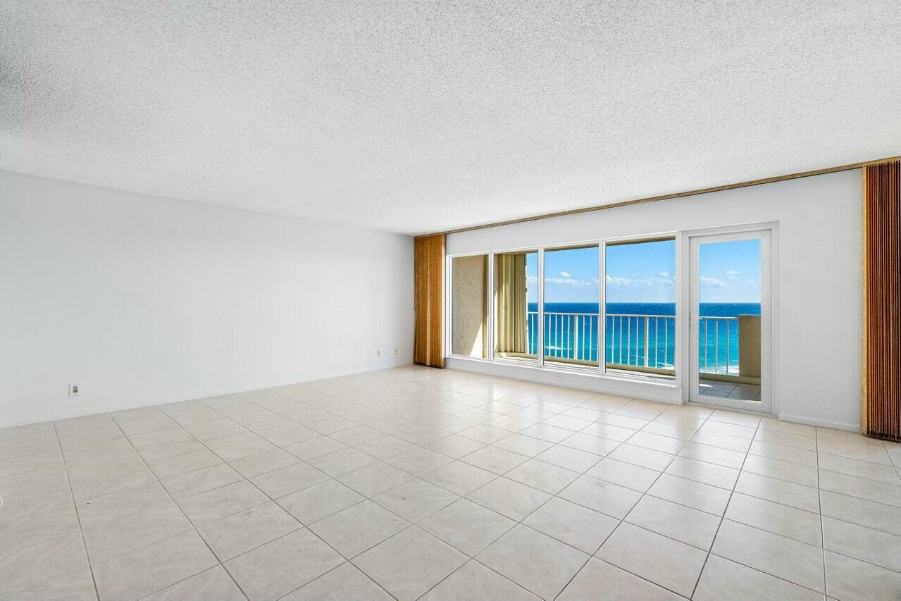 4001 North Ocean Boulevard, Unit 1503 Boca Raton, FL 33431 - Photo 13 of 46 an empty room with windows