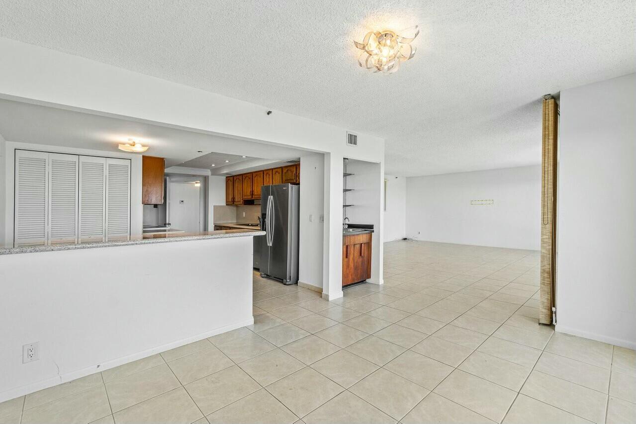 4001 North Ocean Boulevard, Unit 1503 Boca Raton, FL 33431 - Photo 18 of 46 a view of a kitchen with a sink