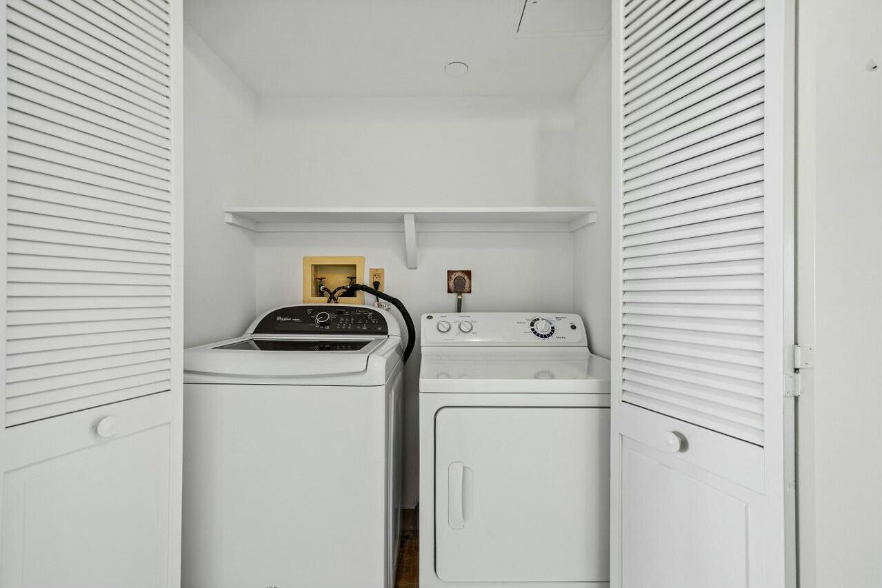 4001 North Ocean Boulevard, Unit 1503 Boca Raton, FL 33431 - Photo 21 of 46 a utility room with dryer and washer