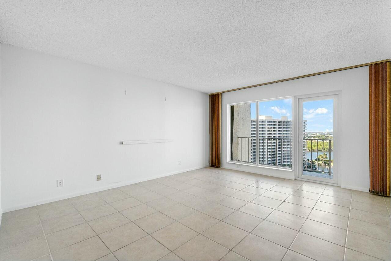 4001 North Ocean Boulevard, Unit 1503 Boca Raton, FL 33431 - Photo 29 of 46 an empty room with windows