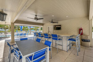 4001 North Ocean Boulevard, Unit 1503 Boca Raton, FL 33431 - Photo 40 of 46 a view of a dining area with furniture window and outside view
