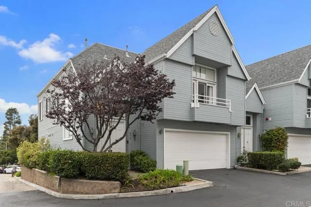 892 Del Mar Downs Road Solana Beach, CA 92075 - Photo 2 of 19 a front view of a house with garden