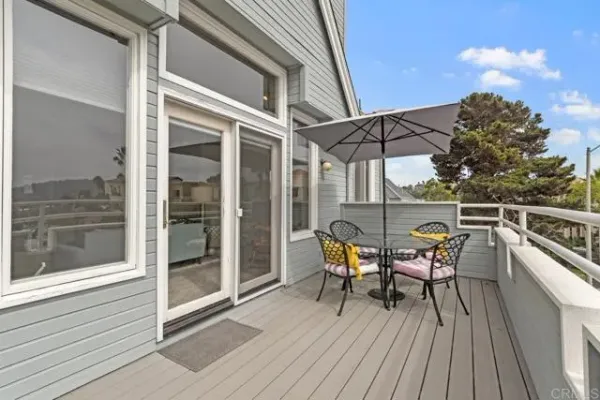 a bedroom with two beds and painted walls