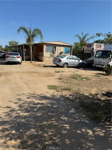 a view of a street with cars