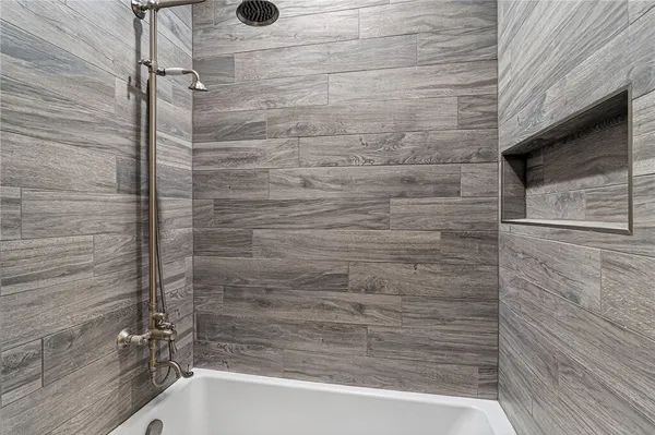 a bathroom with a bathtub